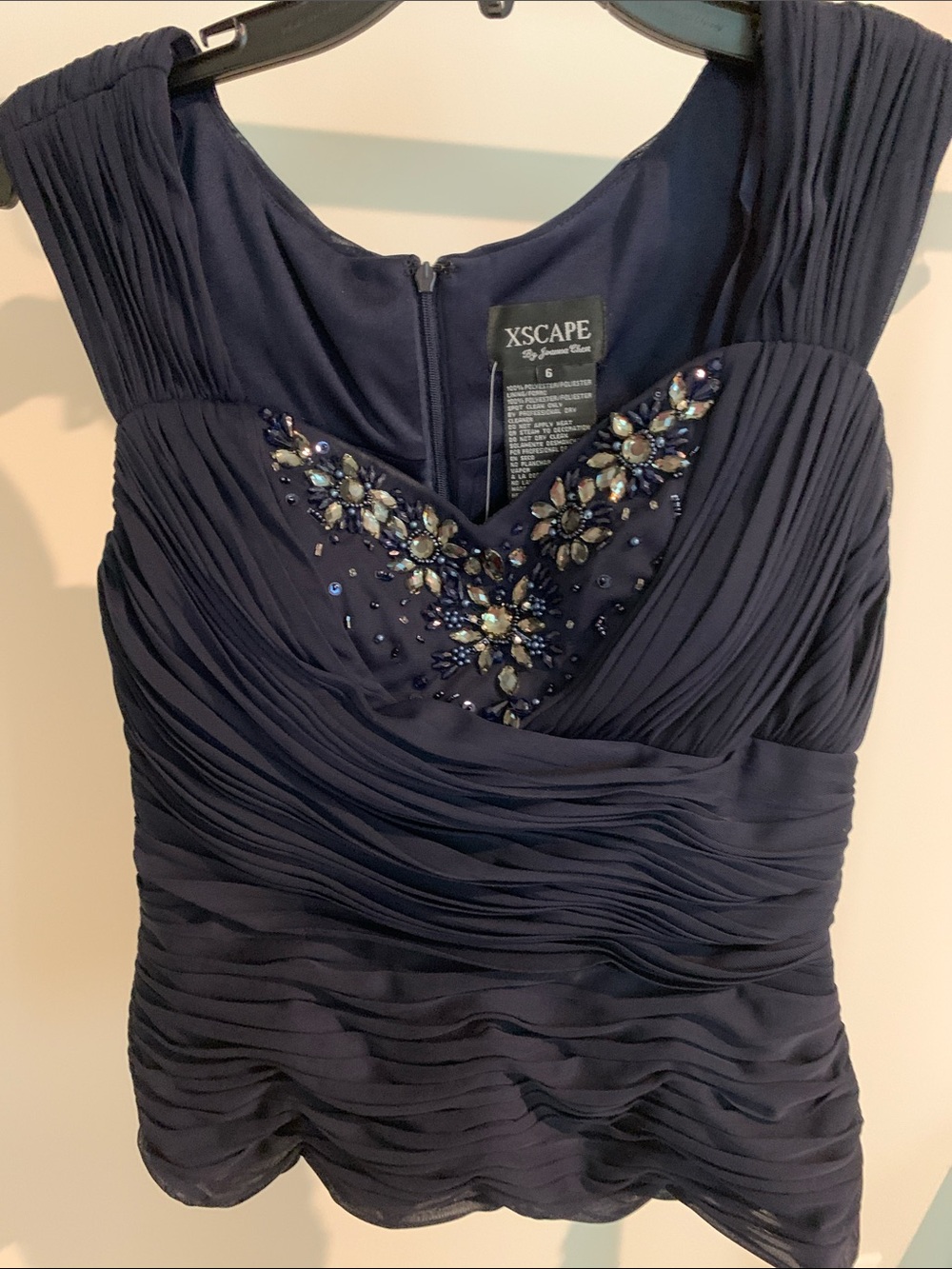 Xscape Navy Beaded Ruched top. SZ 6
New.